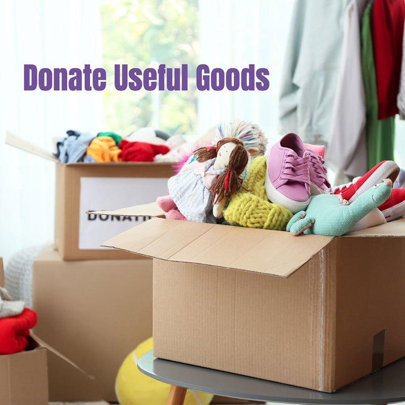 donation-box-with-clothes-and-toys-on-table-indoors-space-for-text-picture-id1132987331